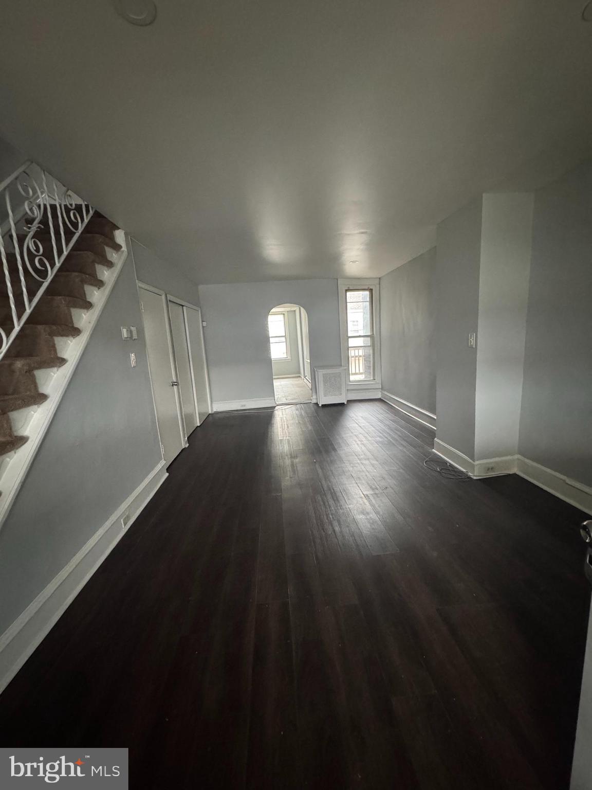 841 Bridge Street Philadelphia, PA 19124 - Photo 7 of 11 a view of an empty room and wooden floor