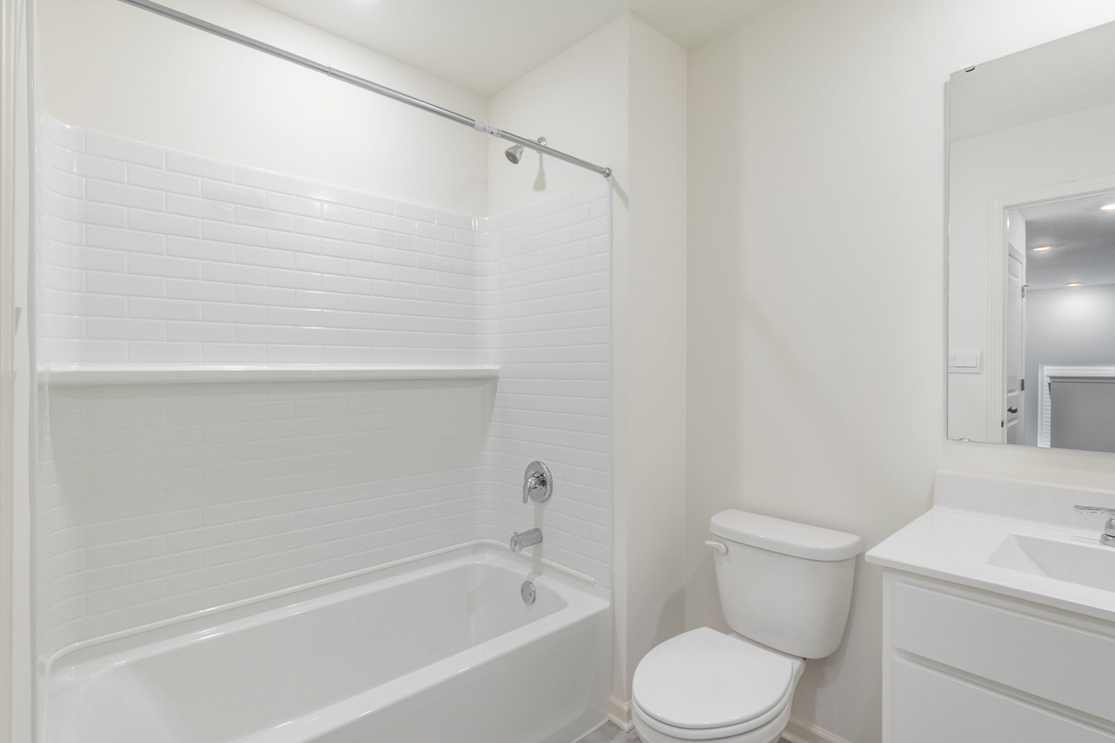 620 Ensign Place Hebron, IN 46341 - Photo 12 of 19 a bathroom with a toilet and a bathtub