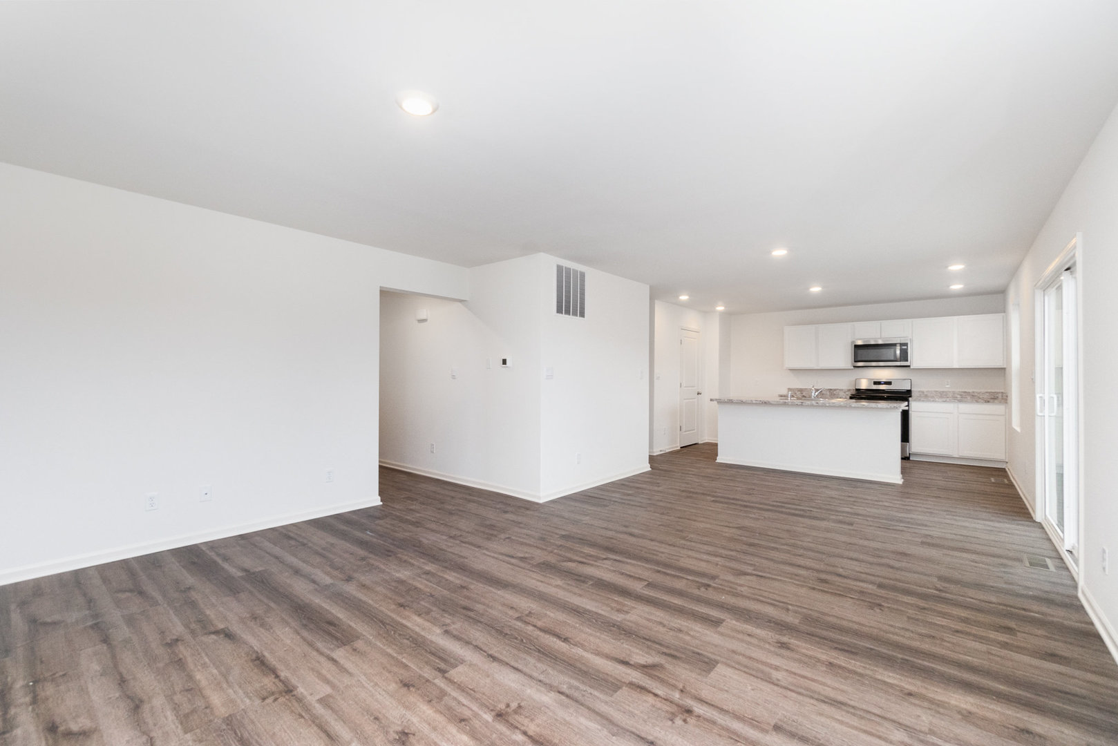 620 Ensign Place Hebron, IN 46341 - Photo 5 of 19 a view of kitchen with wooden floor