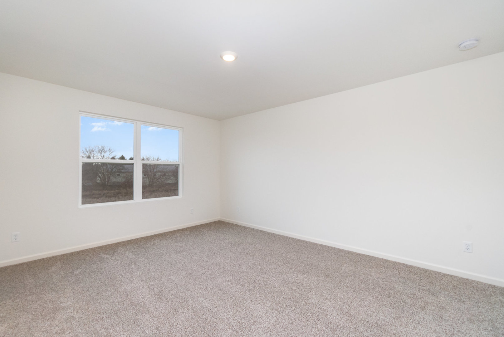 620 Ensign Place Hebron, IN 46341 - Photo 7 of 19 a view of an empty room with a window