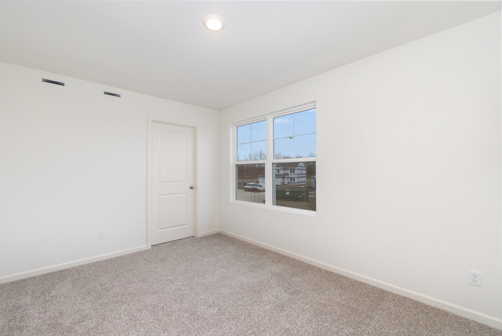 620 Ensign Place Hebron, IN 46341 - Photo 10 of 19 a view of an empty room with a window
