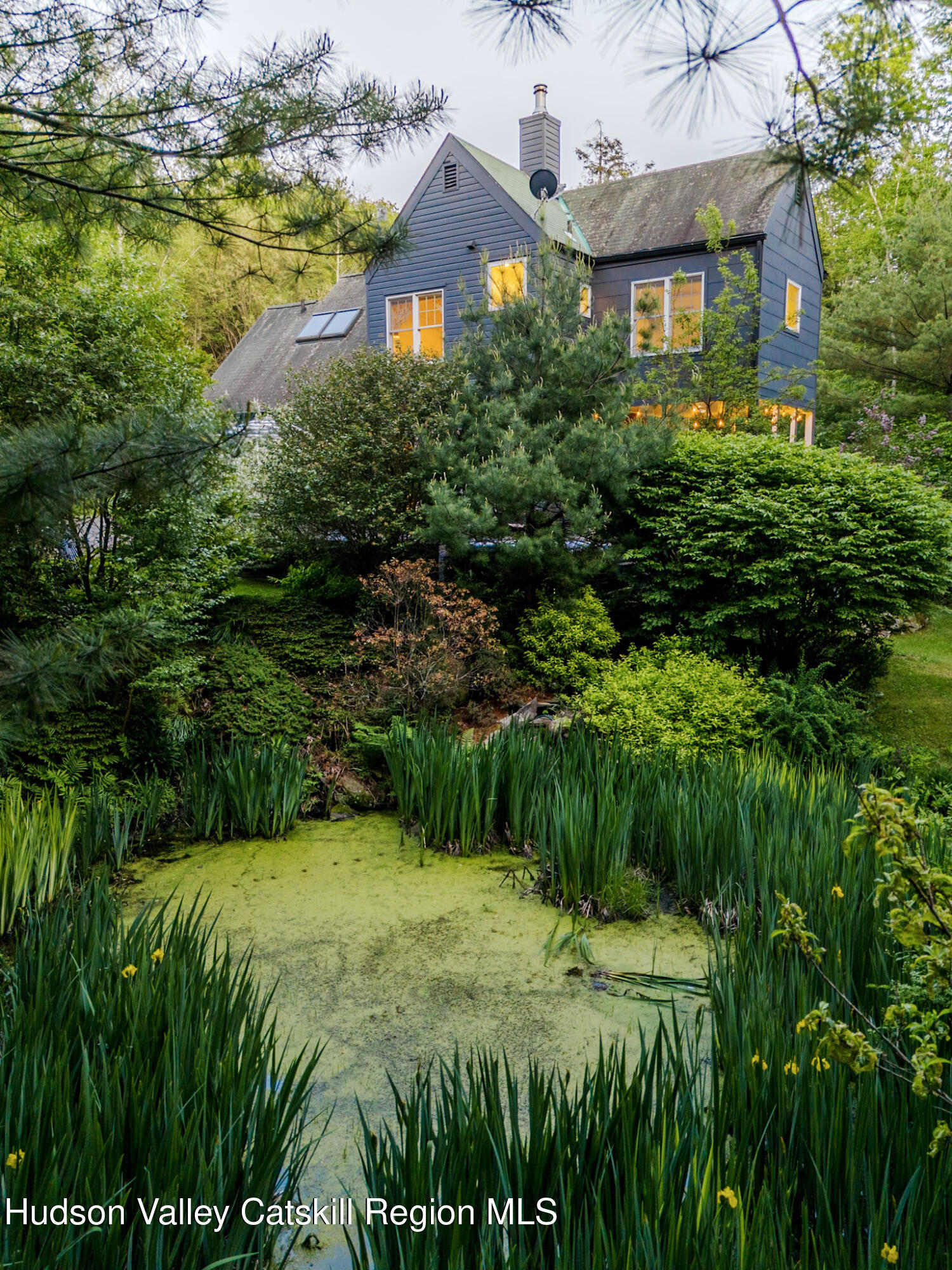 52 Aster Road Olivebridge, NY 12461 - Photo 22 of 23 a view of a garden with a house