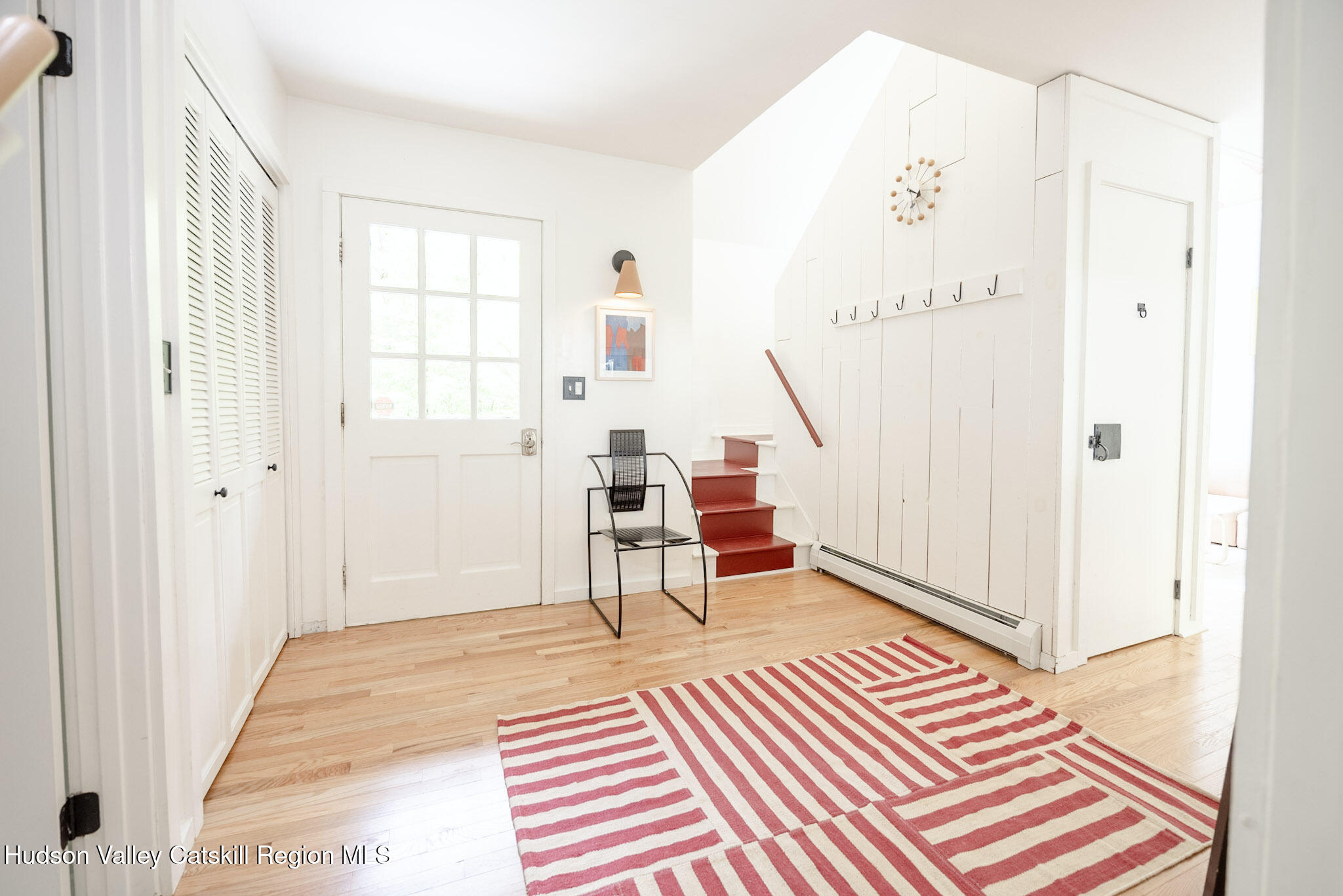 52 Aster Road Olivebridge, NY 12461 - Photo 9 of 23 a view of a bedroom with wooden floor and windows
