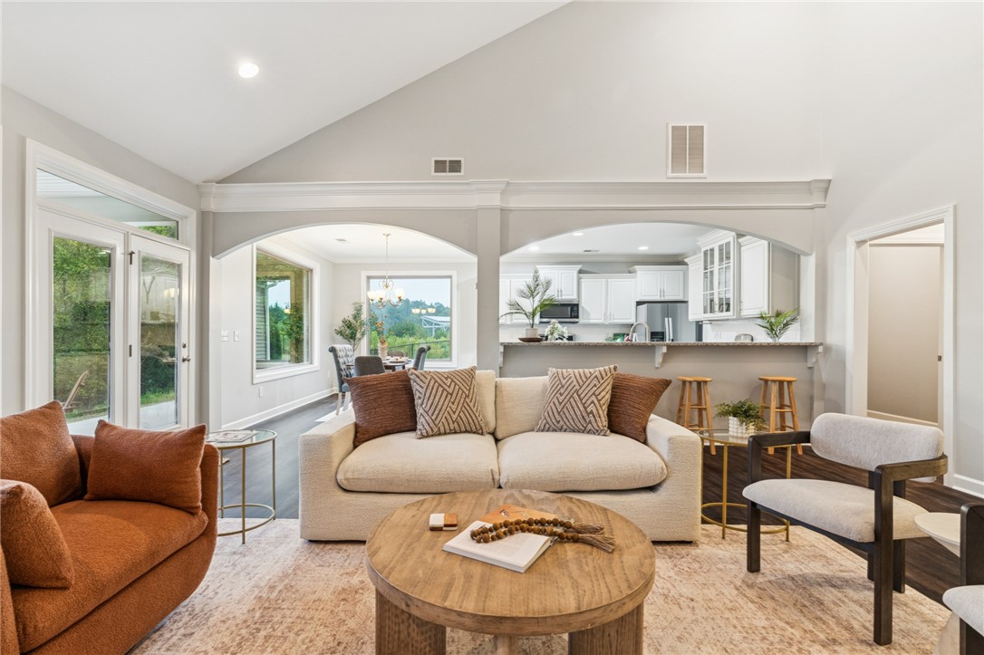 136 Modesto Lane Simpsonville, SC 29681 - Photo 5 of 35 Den and view into kitchen, breakfast nook