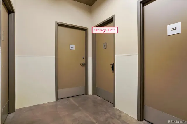 a view of an empty room with a fireplace