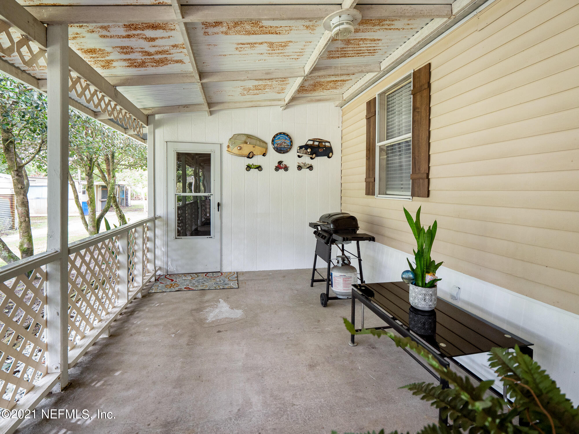 13336 Grover Road Jacksonville, FL 32226 - Photo 42 of 49 42 Main House Front porch is really long