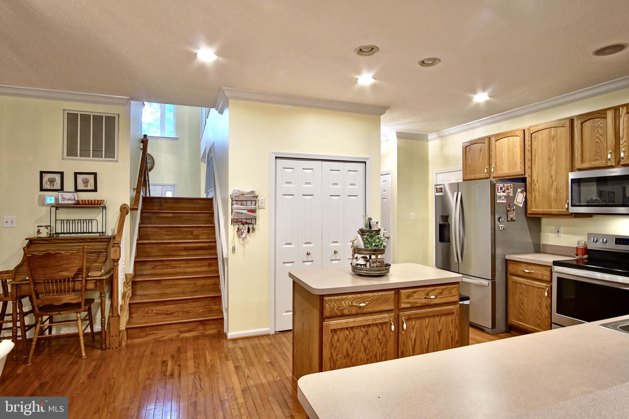 14550 Ivy Dale Court Swan Point, MD 20645 - Photo 16 of 48 Dual stair case