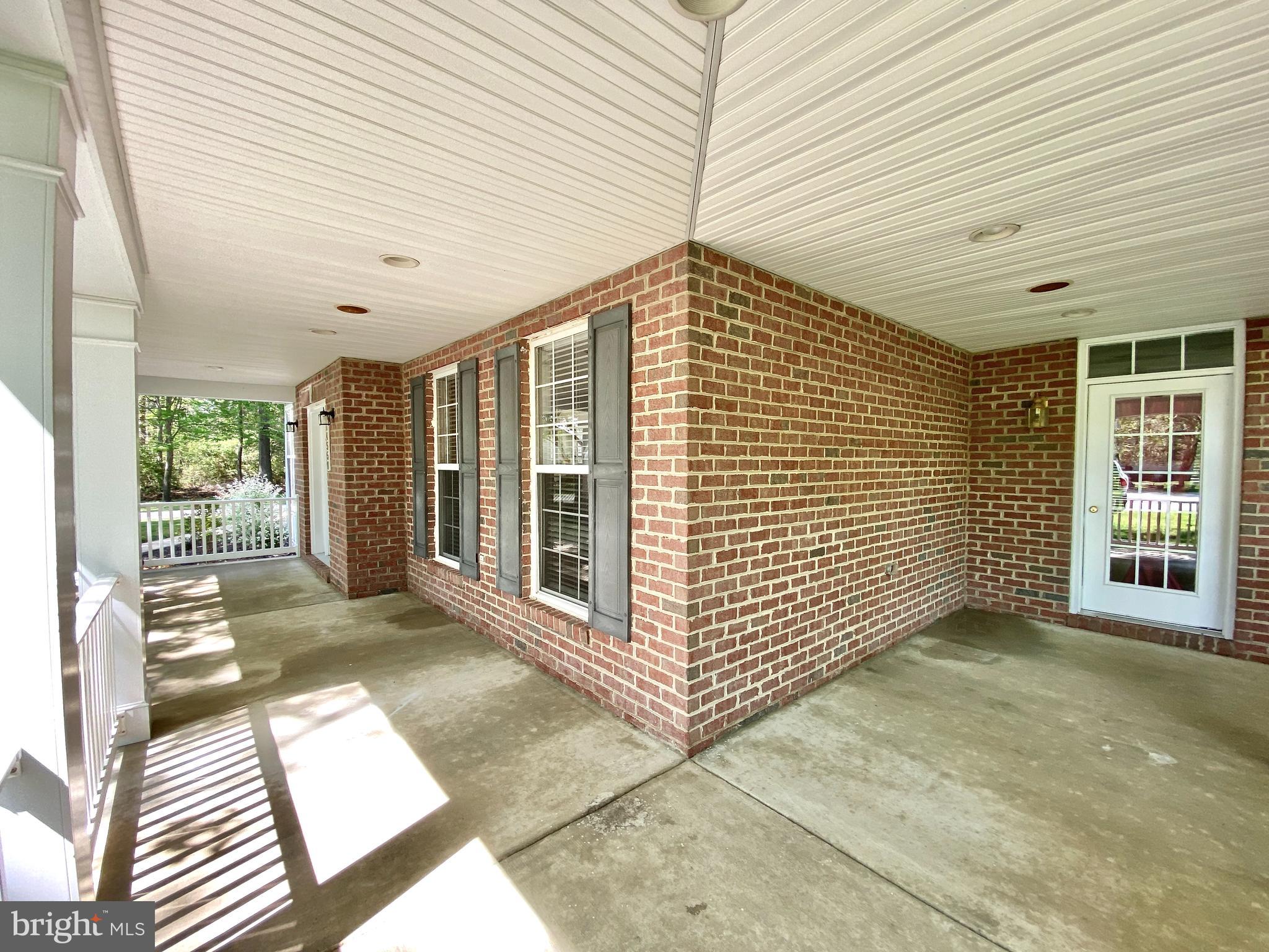 14550 Ivy Dale Court Swan Point, MD 20645 - Photo 4 of 48 Wrap around porch