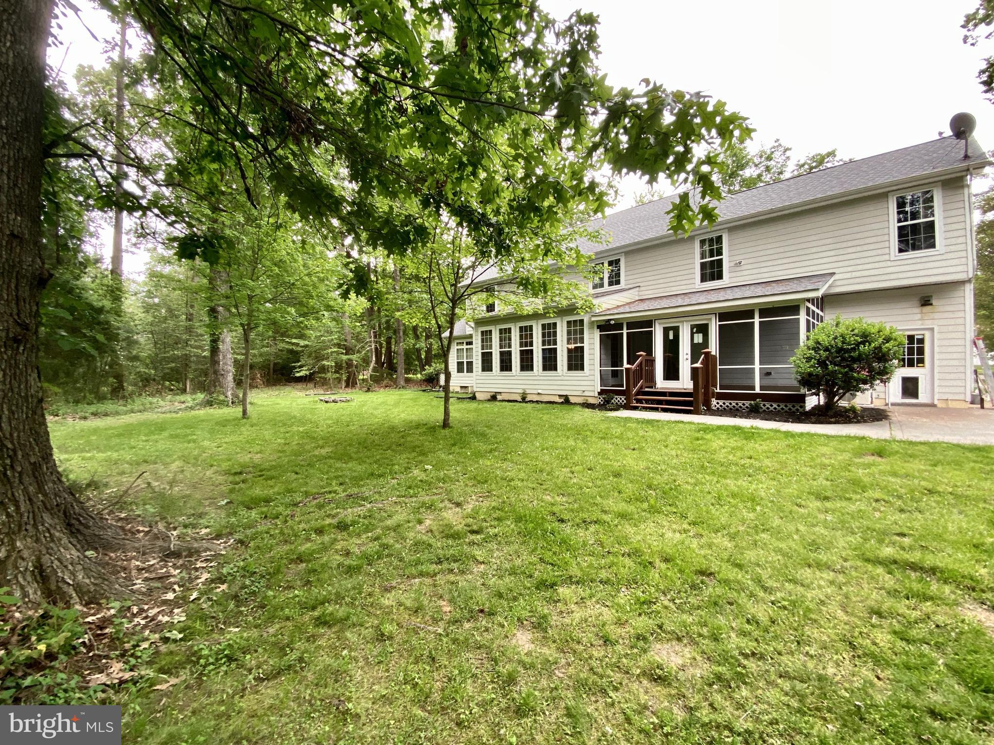 14550 Ivy Dale Court Swan Point, MD 20645 - Photo 48 of 48 Back yard, screened in porch, patio