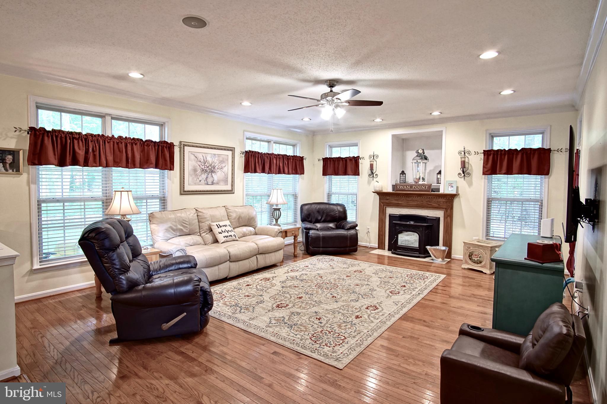 14550 Ivy Dale Court Swan Point, MD 20645 - Photo 7 of 48 Family room - New pellet stove