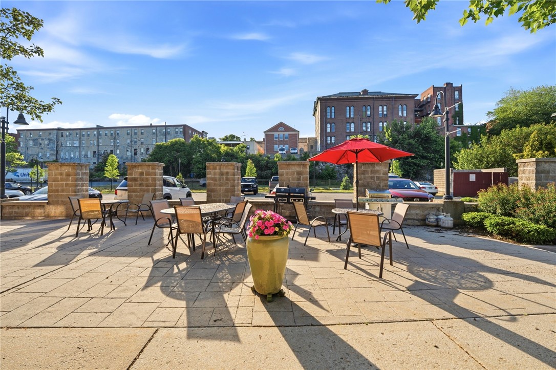 180 Allen Street, Unit 101 Woonsocket, RI 02895 - Photo 34 of 40 communal patio with grill access