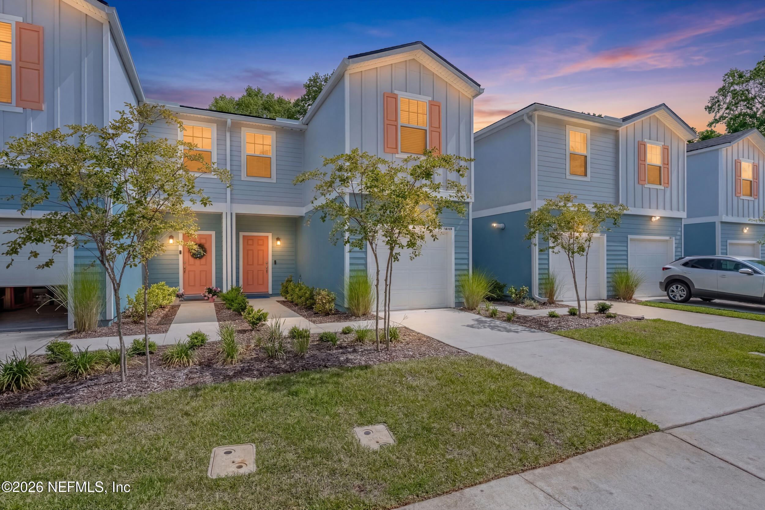 1615 Cluny Road Jacksonville, FL 32218 - Photo 1 of 18 a front view of a house with garden