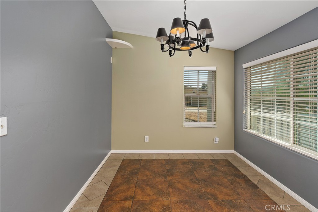 23742 Bundy Canyon Road Wildomar, CA 92595 - Photo 19 of 38 a view of a livingroom with a window