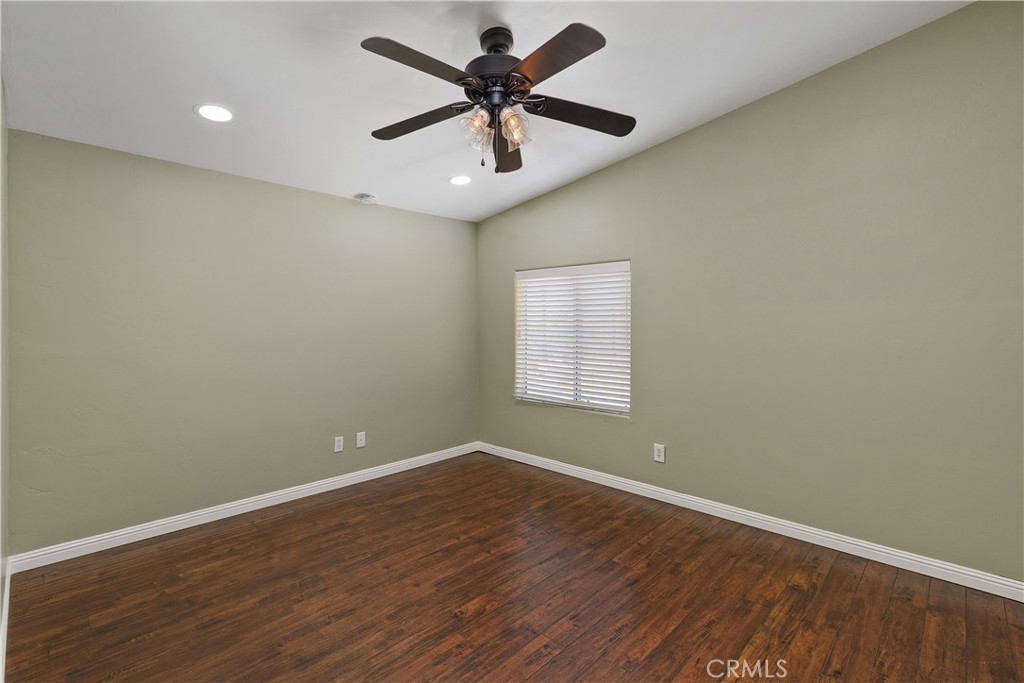 23742 Bundy Canyon Road Wildomar, CA 92595 - Photo 23 of 38 wooden floor in an empty room with a window