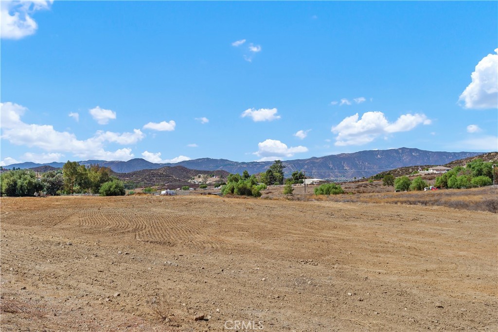 23742 Bundy Canyon Road Wildomar, CA 92595 - Photo 6 of 38 a view of an ocean beach and mountain