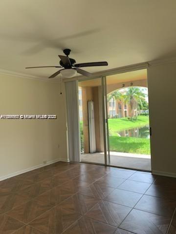 2071 Renaissance Boulevard, Unit 108 Miramar, FL 33025 - Photo 11 of 25 a view of an empty room with a window