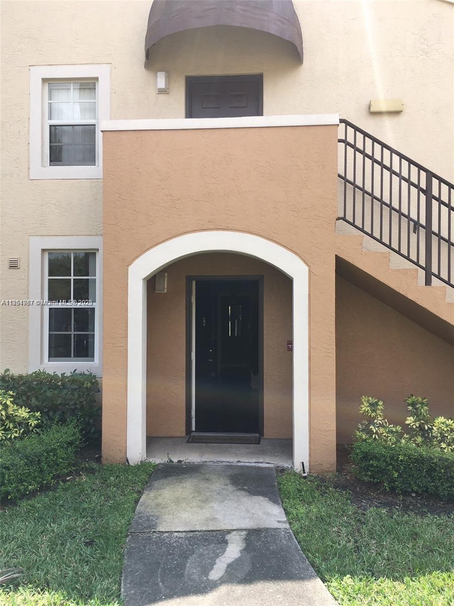 2071 Renaissance Boulevard, Unit 108 Miramar, FL 33025 - Photo 3 of 25 a front view of a house