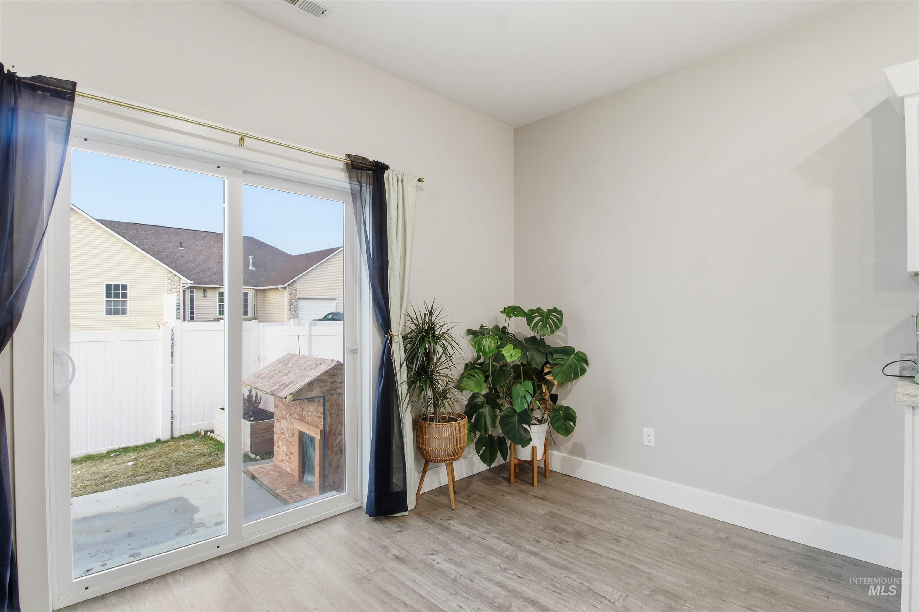 900 East 20th Street Burley, ID 83318 - Photo 16 of 31 Spare room featuring baseboards and light wood-type flooring