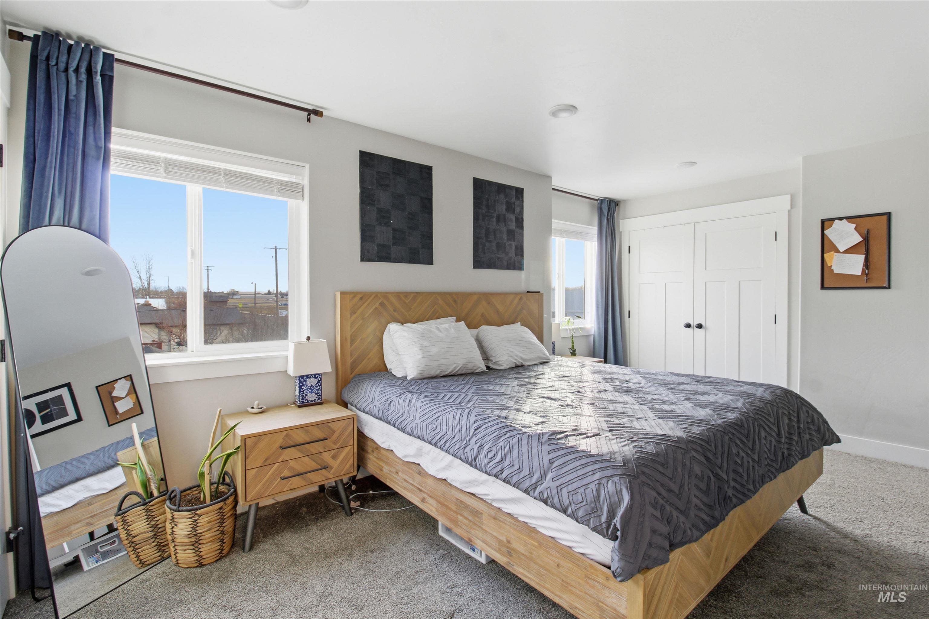 900 East 20th Street Burley, ID 83318 - Photo 19 of 31 Bedroom featuring a closet and carpet