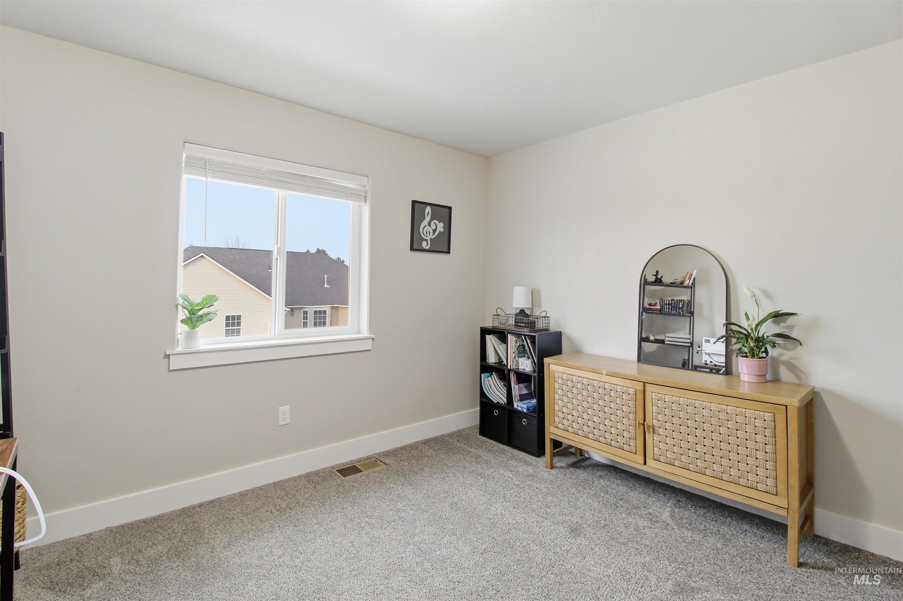 900 East 20th Street Burley, ID 83318 - Photo 26 of 31 Office featuring light colored carpet and baseboards