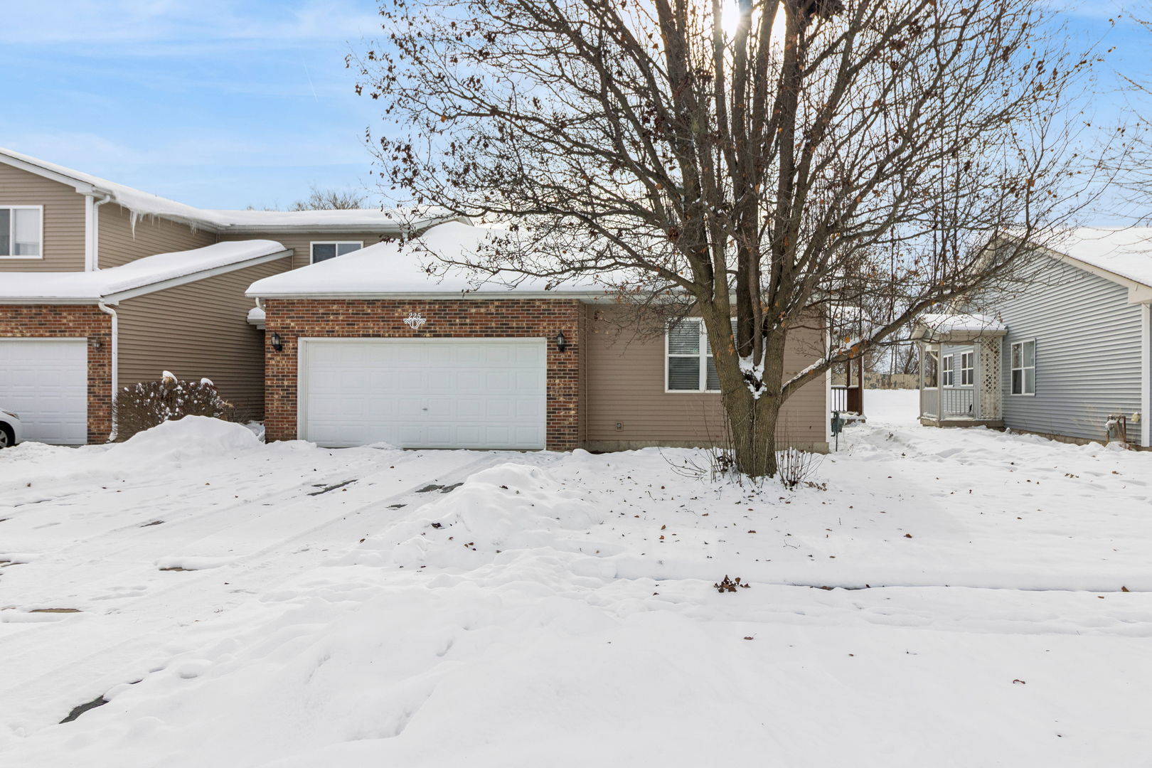 a view of a house with a snow