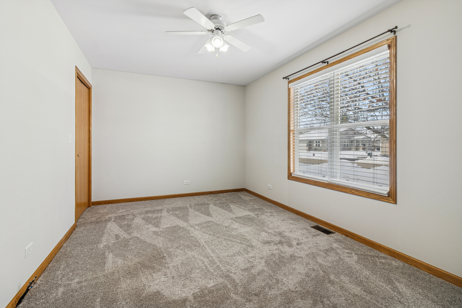225 Morrow Street, Unit D Somonauk, IL 60552 - Photo 16 of 19 a view of an empty room with a window