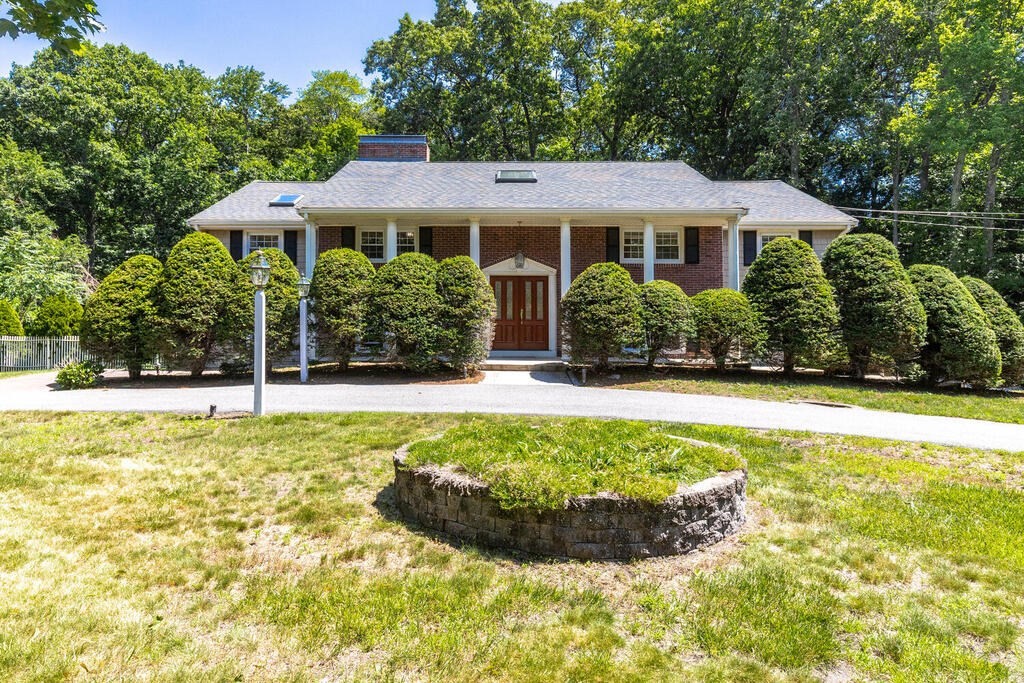 44 Philip Road Lexington, MA 02421 - Photo 1 of 31 a front view of a house with swimming pool