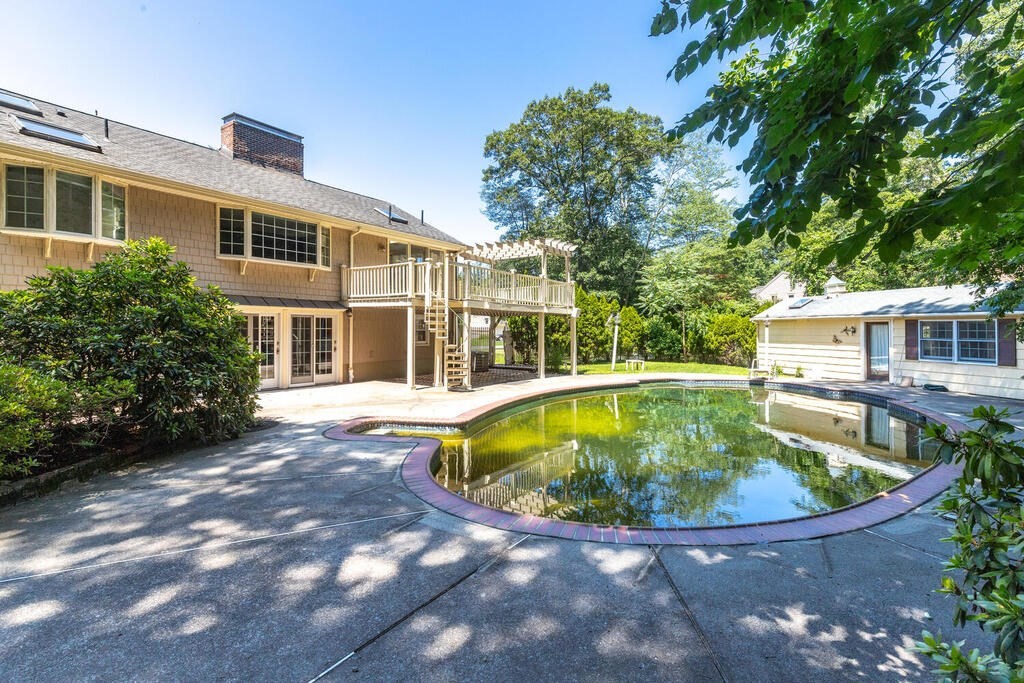 44 Philip Road Lexington, MA 02421 - Photo 29 of 31 a view of a house with swimming pool and sitting area