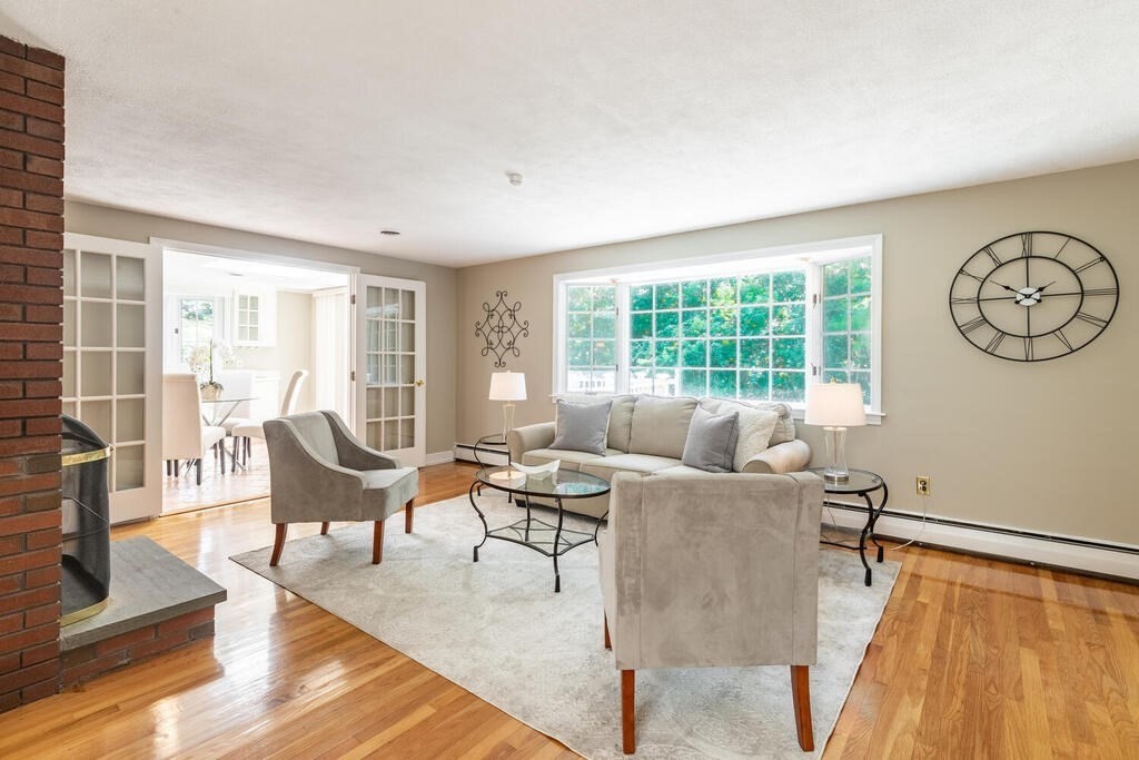44 Philip Road Lexington, MA 02421 - Photo 5 of 31 a living room with furniture and a large window