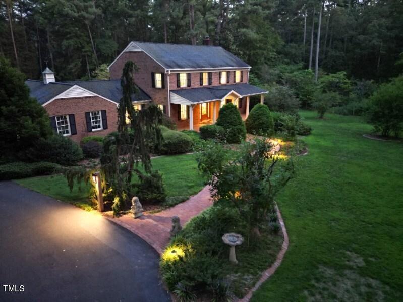 7214 Sunrise Road Chapel Hill, NC 27514 - Photo 1 of 61 a front view of a house with a yard