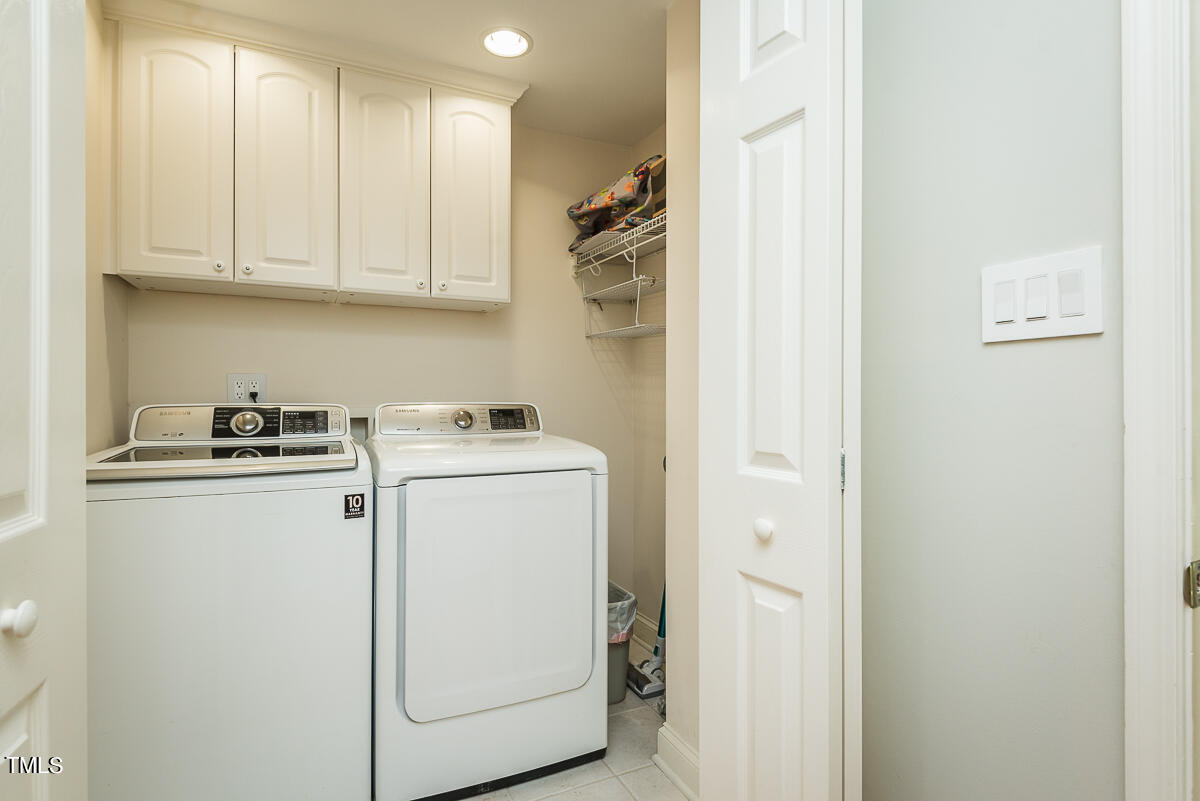 7214 Sunrise Road Chapel Hill, NC 27514 - Photo 36 of 61 a utility room with dryer and washer