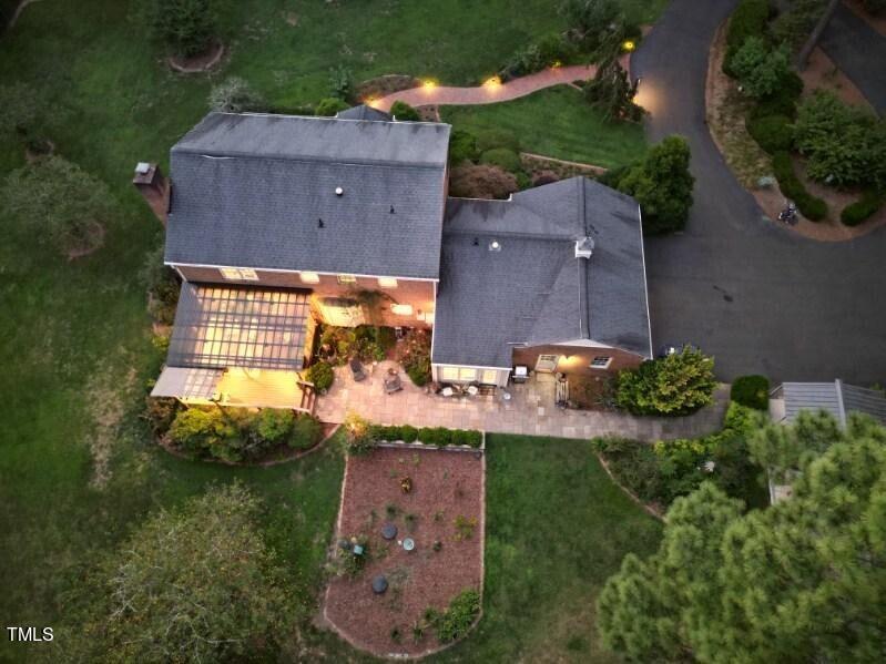 7214 Sunrise Road Chapel Hill, NC 27514 - Photo 52 of 61 an aerial view of a house with a yard pool basket ball court and outdoor seating