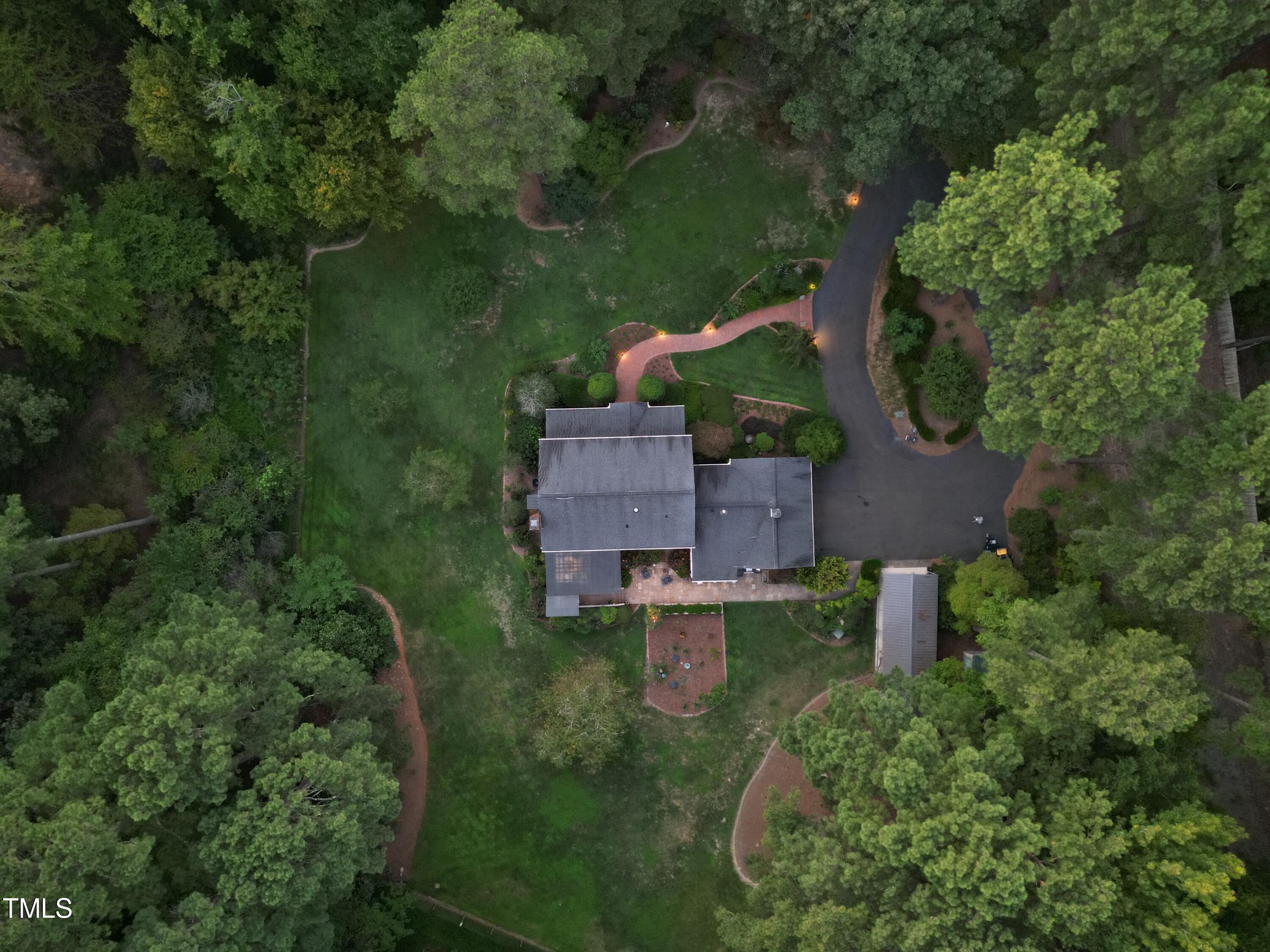 7214 Sunrise Road Chapel Hill, NC 27514 - Photo 57 of 61 an aerial view of a house with a yard