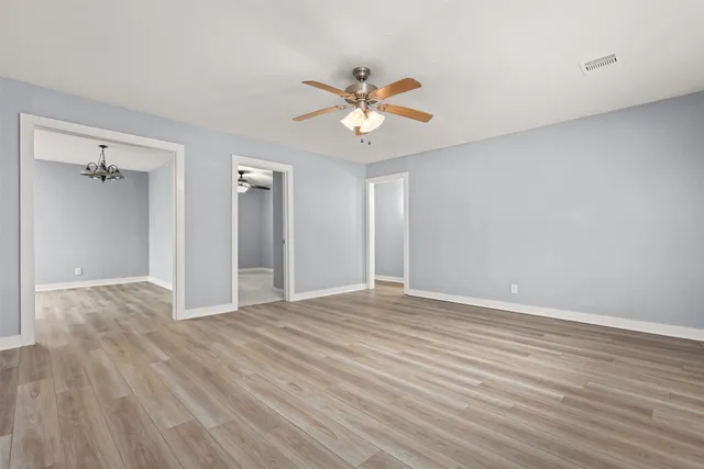 a view of an empty room with a window