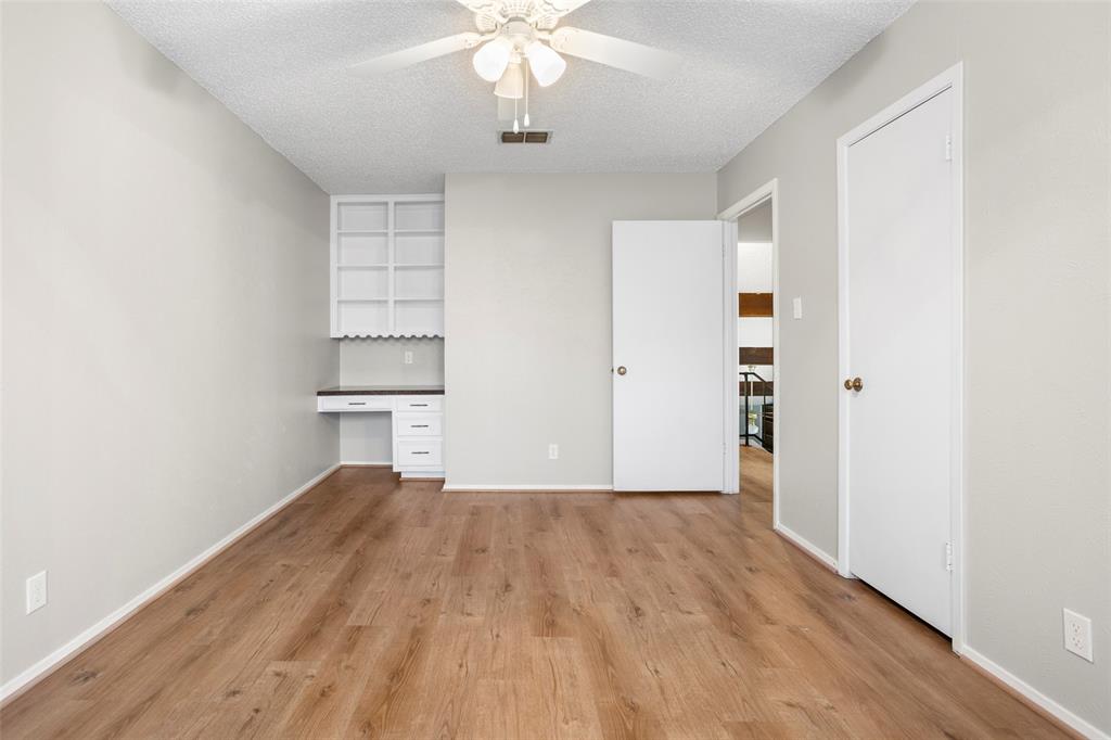 1024 Edgewood Trail Benbrook, TX 76126 - Photo 28 of 28 wooden floor in an empty room with a window