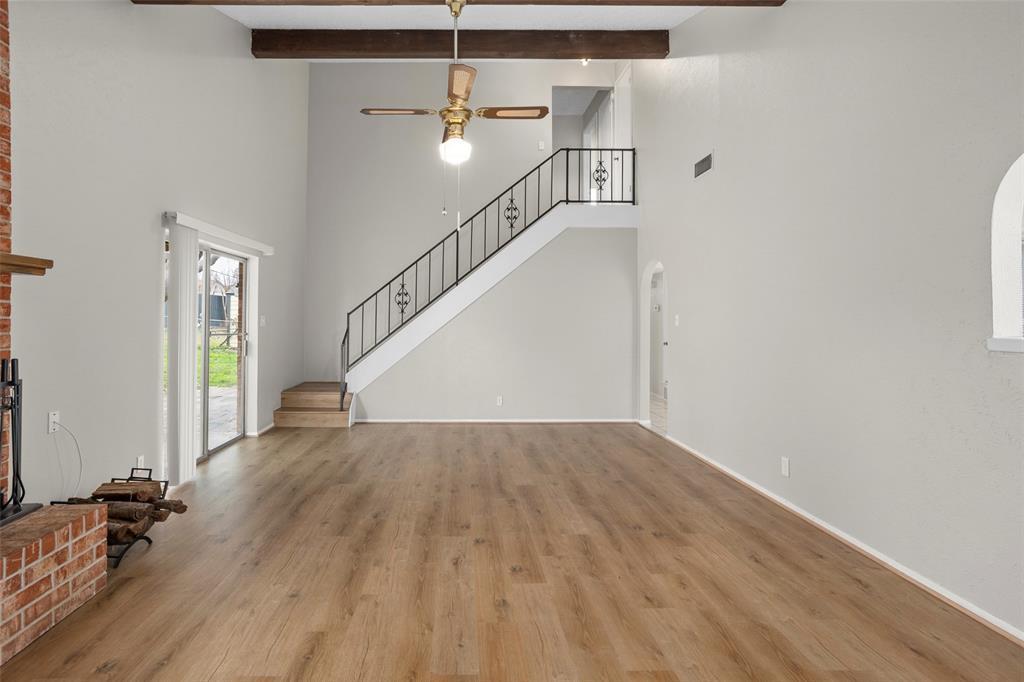 1024 Edgewood Trail Benbrook, TX 76126 - Photo 8 of 28 a view of empty room with wooden floor