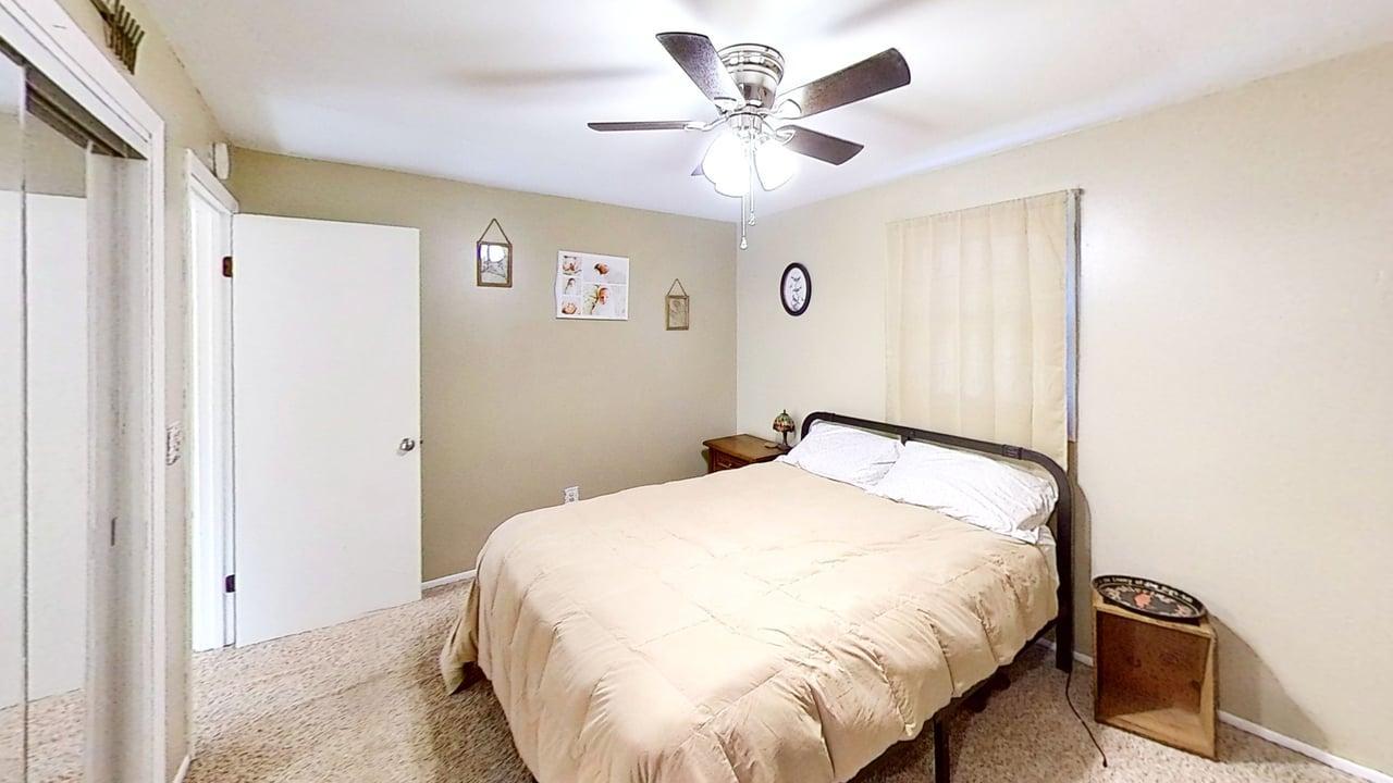 17 Greenlawn Drive Kankakee, IL 60901 - Photo 18 of 29 a bedroom with a bed and a window