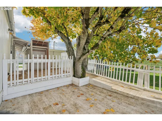 a view of a balcony with city view