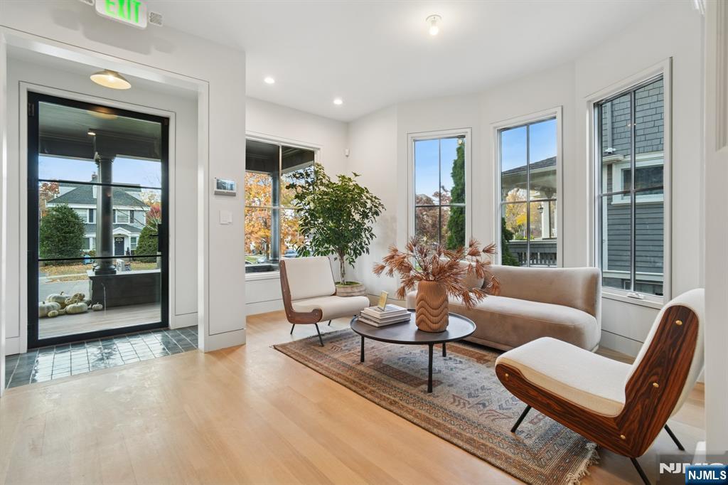 75 Midland Avenue Montclair, NJ 07042 - Photo 17 of 26 a living room with furniture and a large window