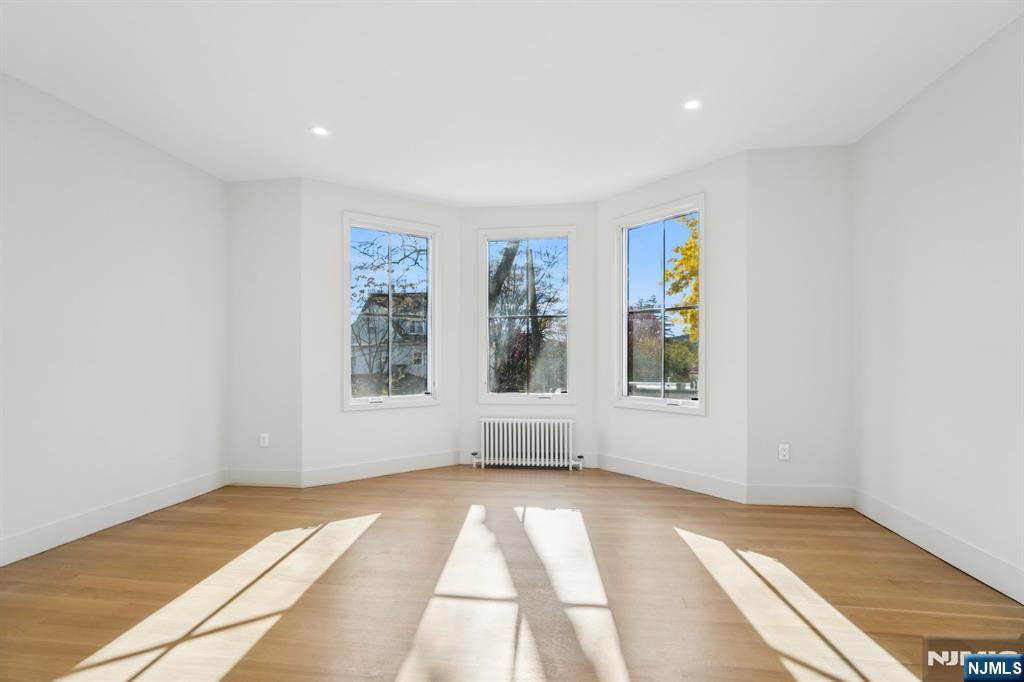75 Midland Avenue Montclair, NJ 07042 - Photo 4 of 26 a view of an empty room with a window