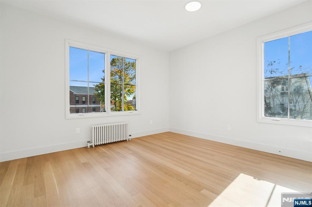 75 Midland Avenue Montclair, NJ 07042 - Photo 10 of 26 a view of an empty room with a window