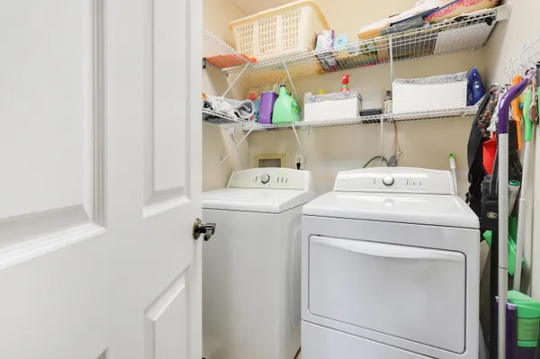 a bathroom with a toilet a sink and a shower
