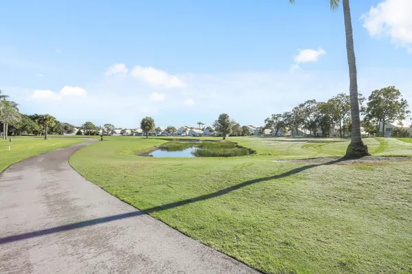 a view of a golf course with a yard