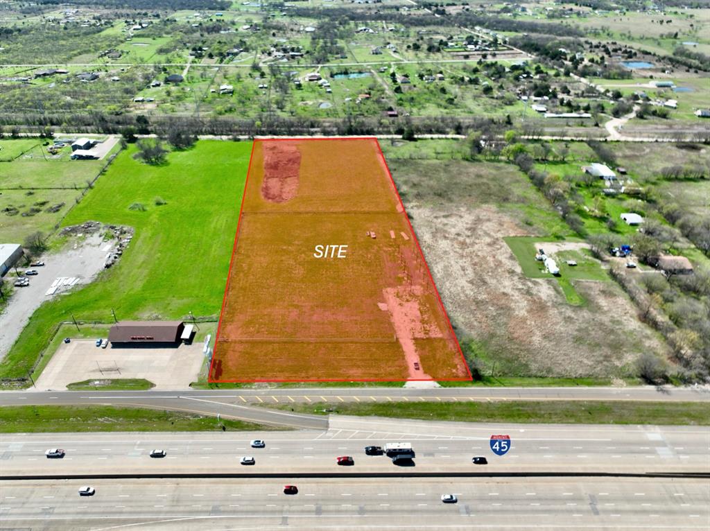 8.06 Northwest Mckinney Street Rice, TX 75155 - Photo 2 of 11 an aerial view of a yard