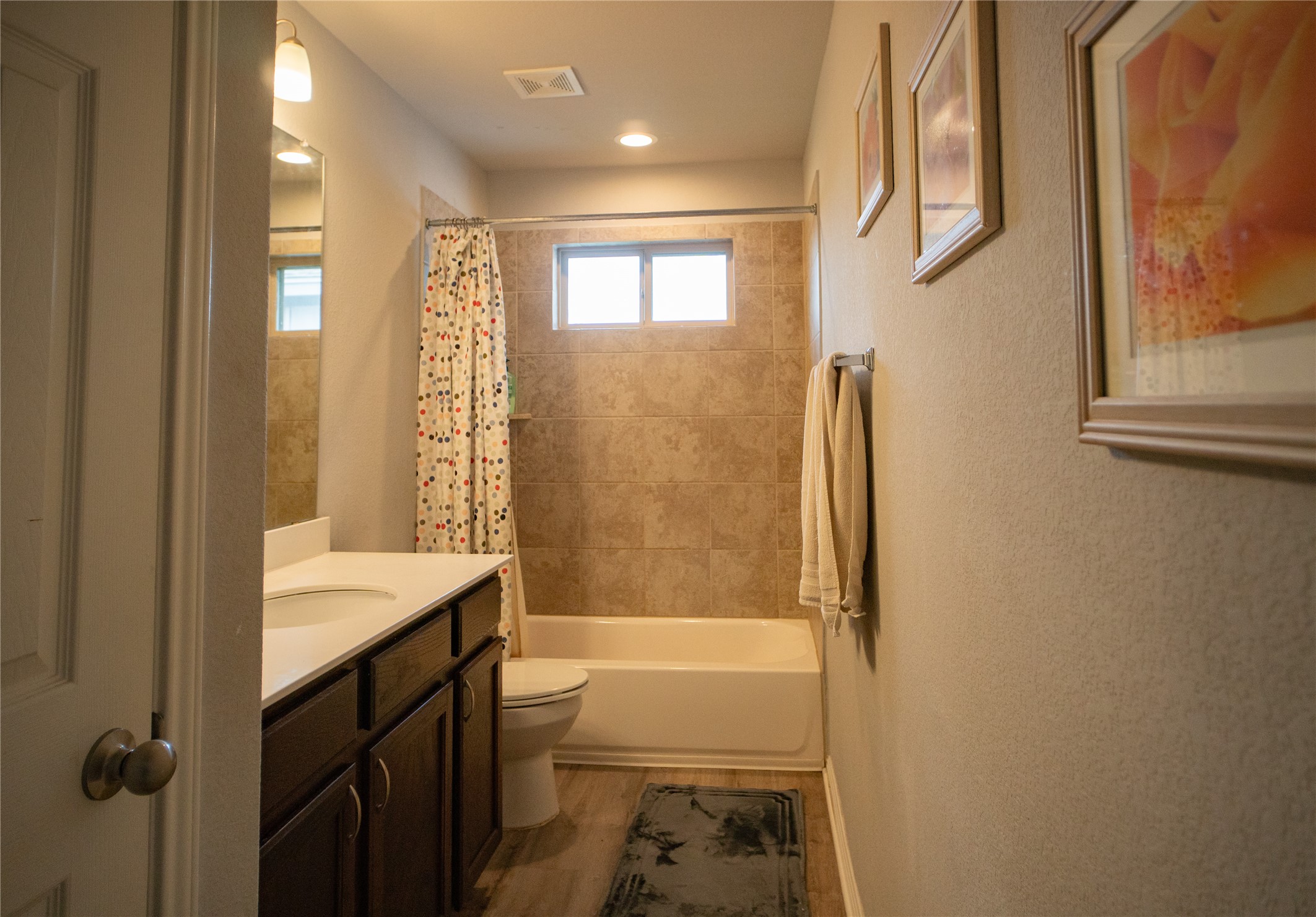160 Shearwater Lane Leander, TX 78641 - Photo 15 of 24 a bathroom with a granite countertop sink toilet and shower