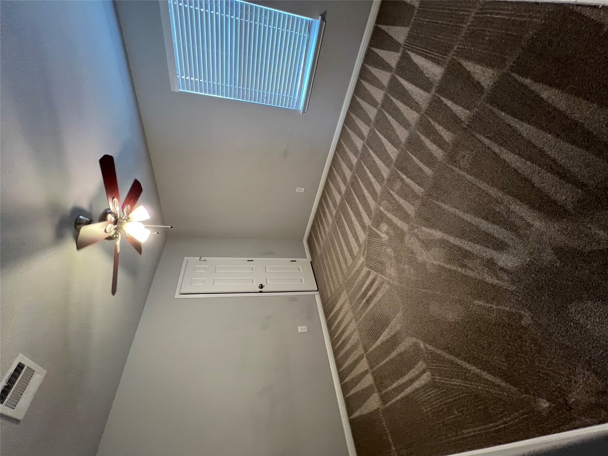 160 Shearwater Lane Leander, TX 78641 - Photo 18 of 24 a view of a room with a ceiling fan and a rug