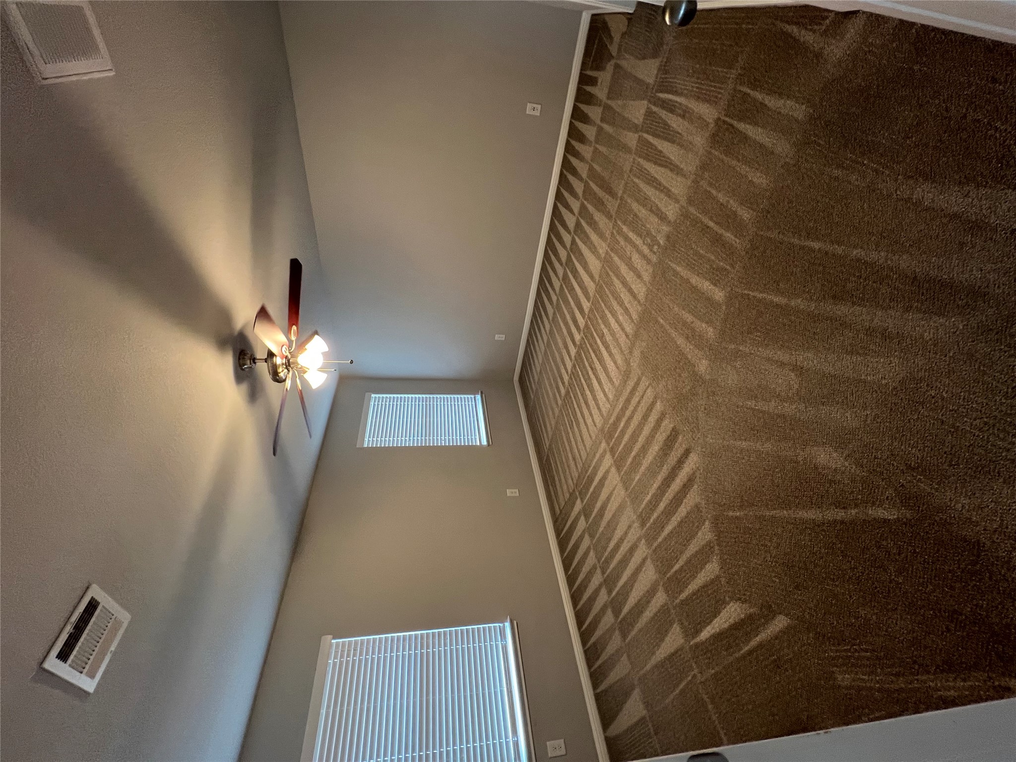 160 Shearwater Lane Leander, TX 78641 - Photo 21 of 24 a bedroom with a bed and a chandelier fan