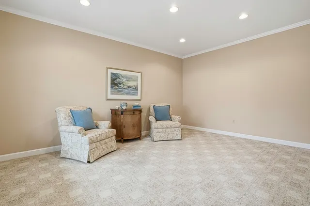 a bedroom with a flat screen tv and a bed