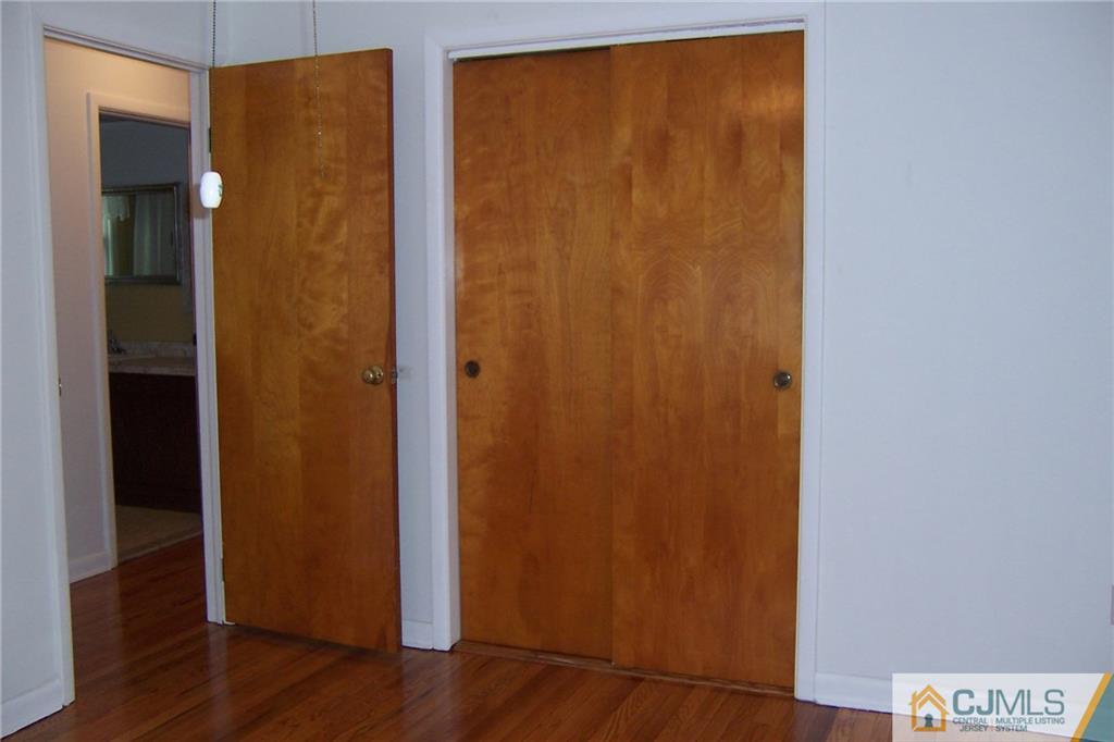 65 East Cliff Road Colonia, NJ 07067 - Photo 13 of 25 an entryway door with wooden floor