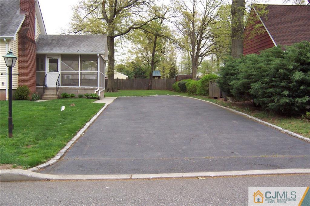 65 East Cliff Road Colonia, NJ 07067 - Photo 24 of 25 a view of a house with a yard